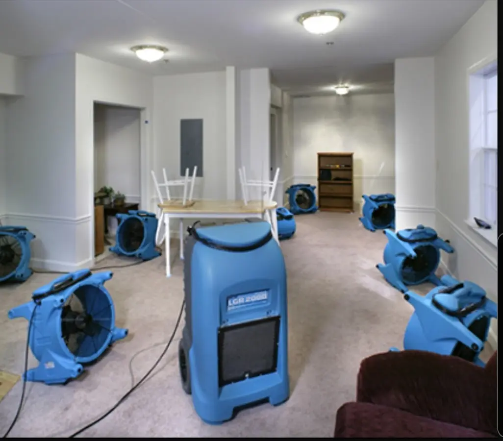 Air movers and dehumidifier setup for Water Damage Restoration in Poinciana